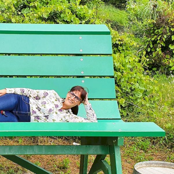 Green bench in Neive